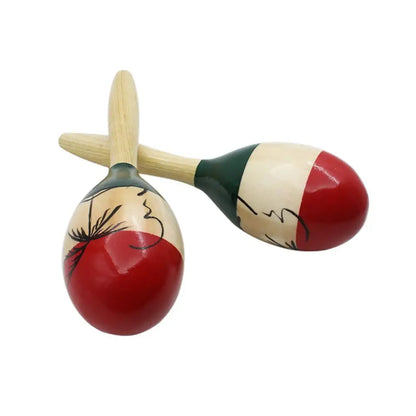 Hand-painted maracas wooden with red white and green stripes and black line art designs for tropical party percussion