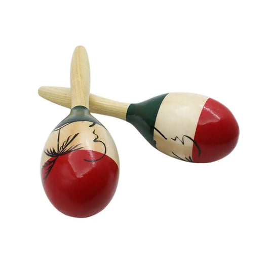 Hand-painted maracas wooden with red white and green stripes and black line art designs for tropical party percussion