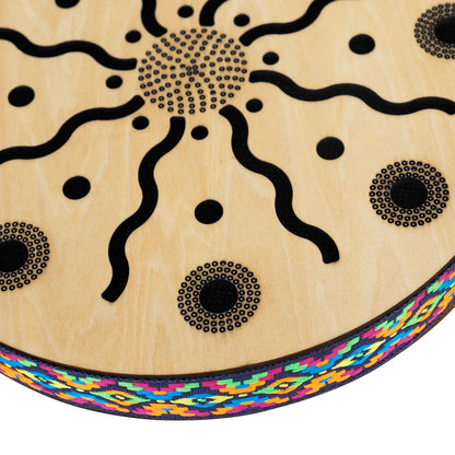 Light-colored wooden 8 inch stream drum with black laser-engraved sun pattern and colorful trim for sound therapy instrument