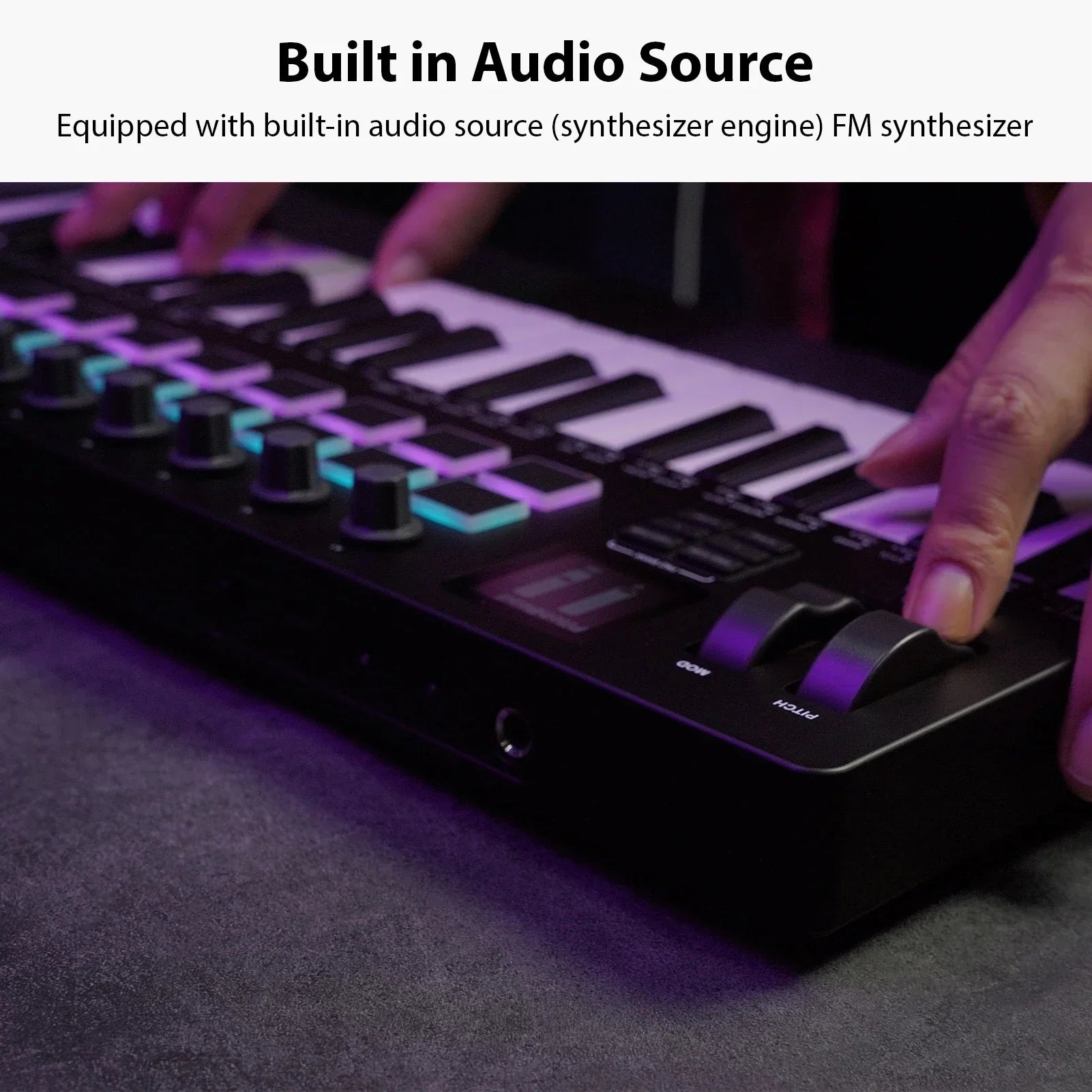 Black midi keyboard controller with white and black keys and purple backlit knobs and faders synthesizer engine bt wireless