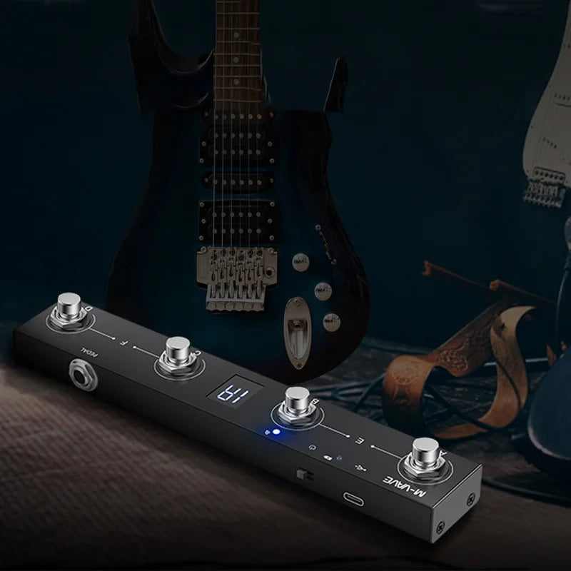 Black M-audio footswitch pedal with four silver knobs digital display and usb-c port midi foot controller with usb support