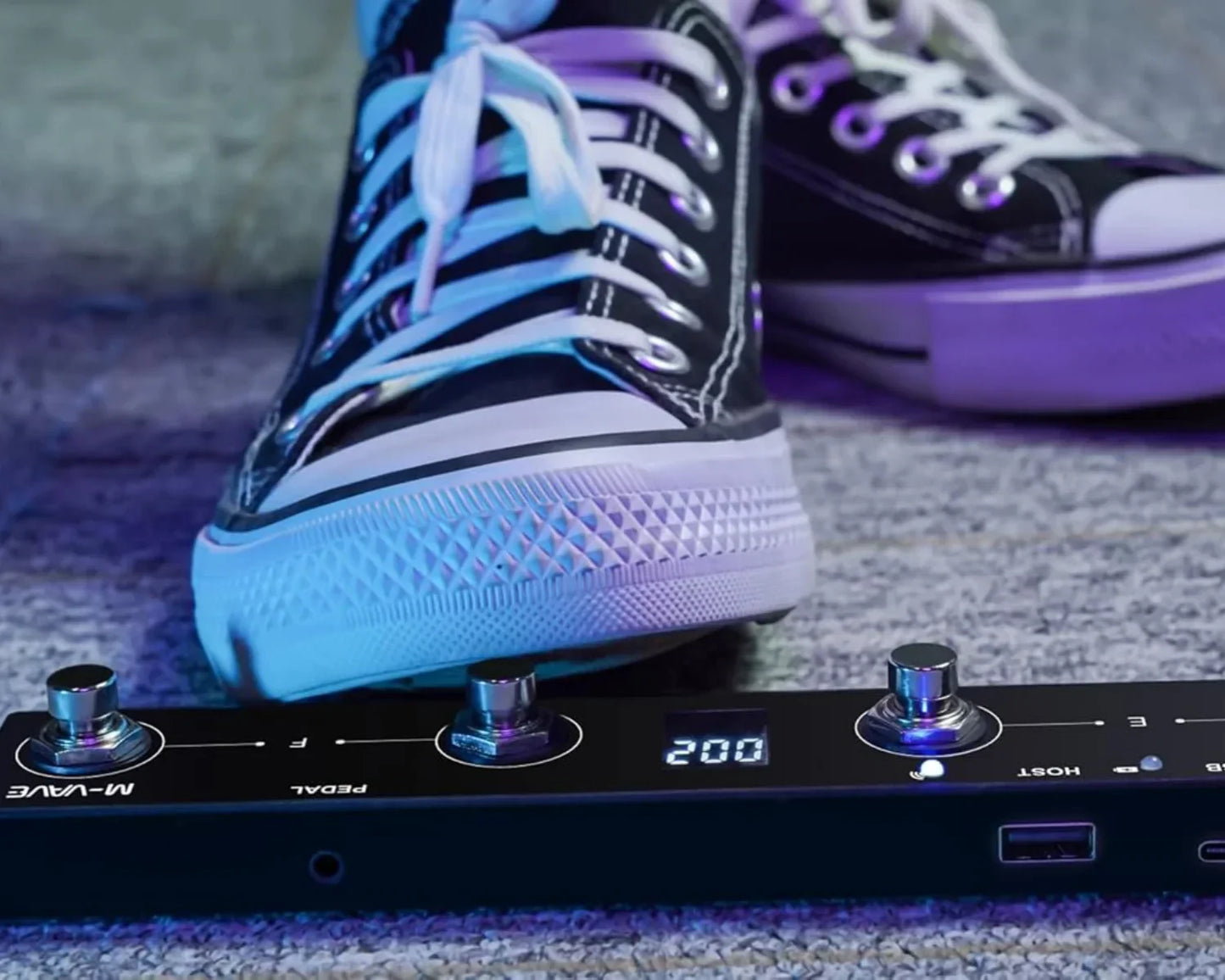 Black m-wave plus portable wireless midi foot controller with silver knobs and digital display for musicians and djs