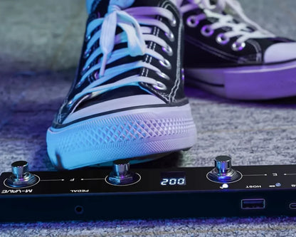Black m-wave plus portable wireless midi foot controller with silver knobs and digital display for musicians and djs