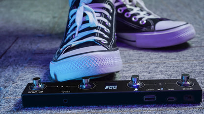 Black m-audio chocolate plus programmable midi controller foot pedal with silver knobs and blue led display for usb use