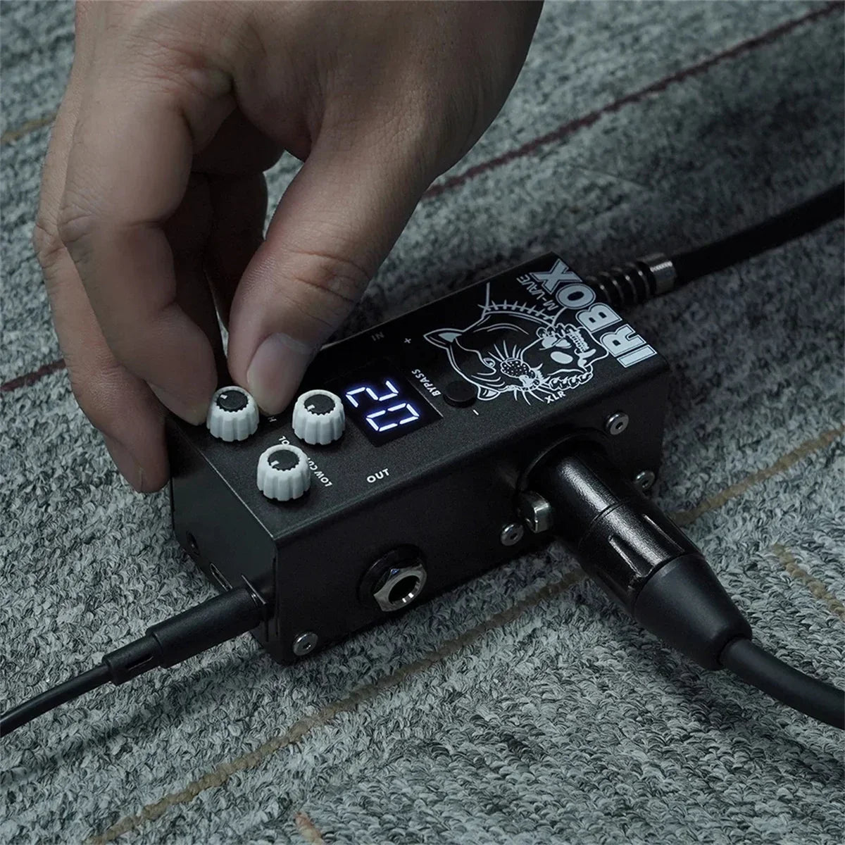 Black irbox mule audio effects pedal with white knobs and digital display showing 27 featuring ir cab impulse response and output port in 6th group