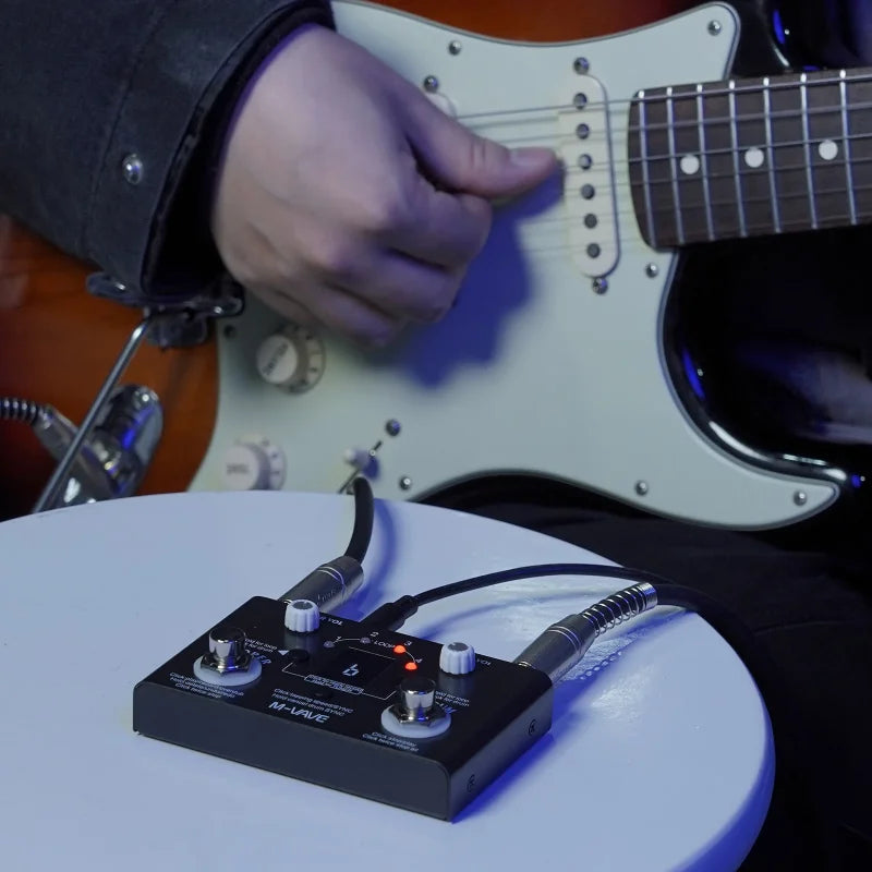 Black m-audio footswitch pedal with silver knobs and glowing red led for m-vave lost tempo v2 drum machine with high precision tuner and recording time