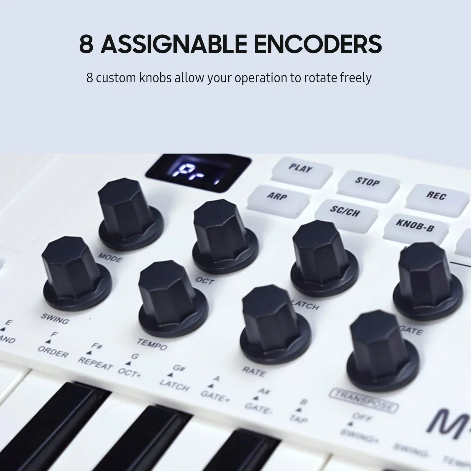 White m-vave midi controller keyboard with eight black hexagonal encoders small digital display and rgb backlit pads