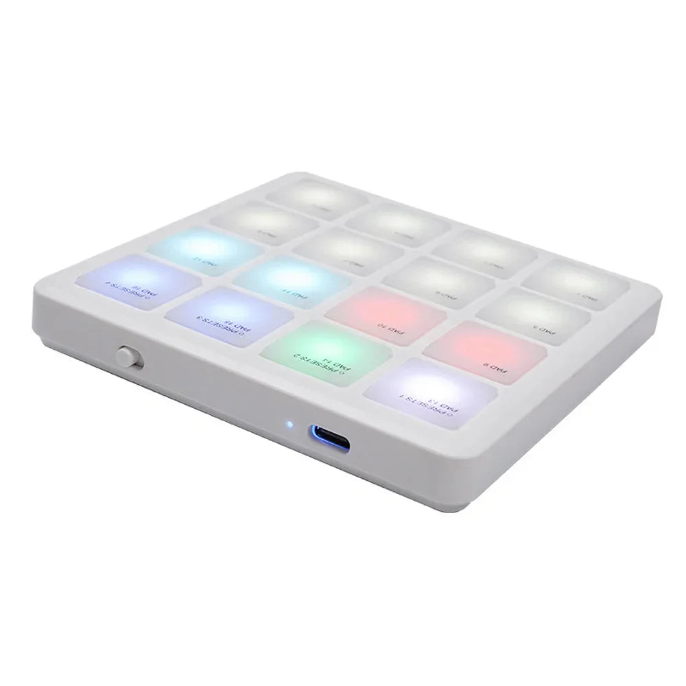 White rectangular midi controller pad with 16 sensitive rgb backlight pads and usb-c keyboard machine connection port
