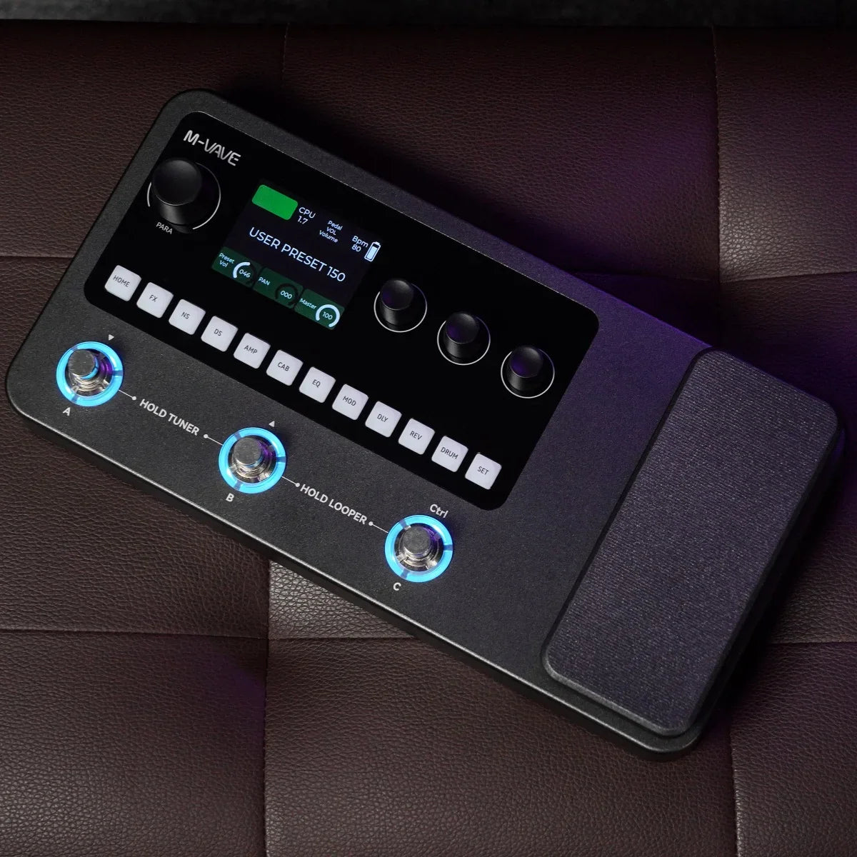 Black m-audio m-vave mk-20 multi-effects processor with blue led footswitch rings and digital preset display for guitar and bass