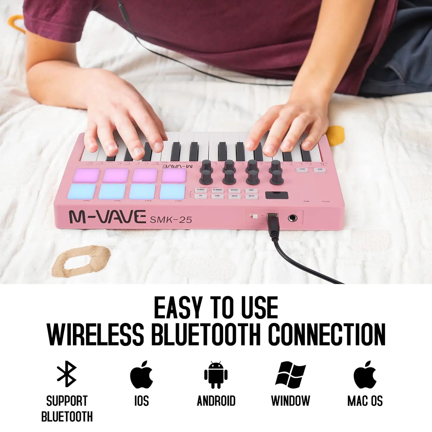 Pink m-vave smk-25 midi controller with velocity-sensitive black keys, colorful drum pads, and usb-b type interface