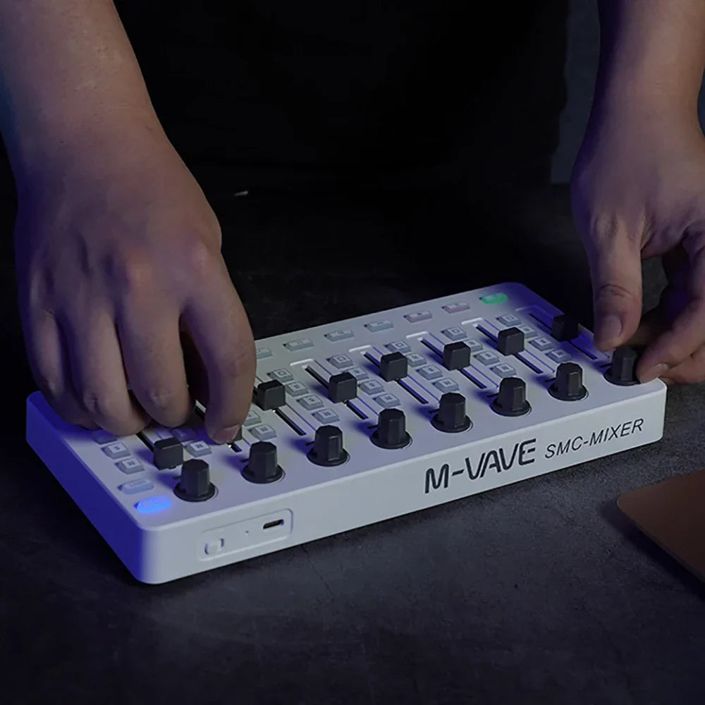 White m-vave smc-mixer wireless midi controller console bt connection with black knobs and blue led lights