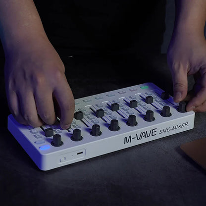 White m-vave smc-mixer wireless midi controller console bt connection with black knobs and blue led lights