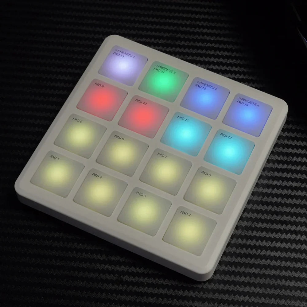 White square m-vave smc-pad portable wireless midi controller with 16 illuminated pads suitable percussion use