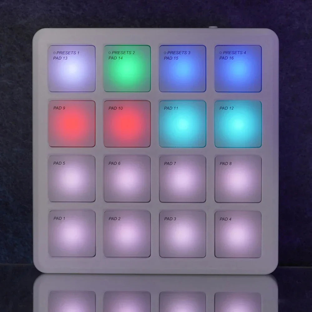 White square m-vave smc-pad portable wireless midi controller with 16 illuminated pads suitable percussion use