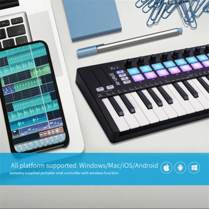 Black and white m-vave smk-25 ii midi keyboard controller with colorful rgb drum pads and 25 mini keys for music production
