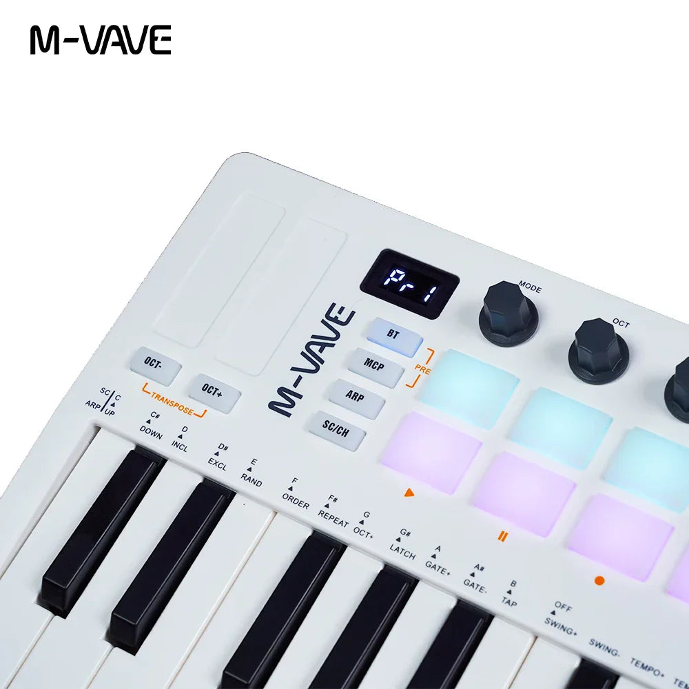 White m-vave midi pad controller rechargeable keyboard with black keys and illuminated rgb drum pads for music production
