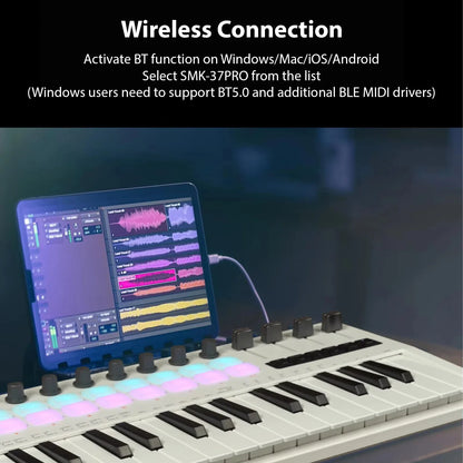 White and black m-vave smk-37 pro keyboard midi controller with rgb backlit drum pads sliders music production connected to tablet