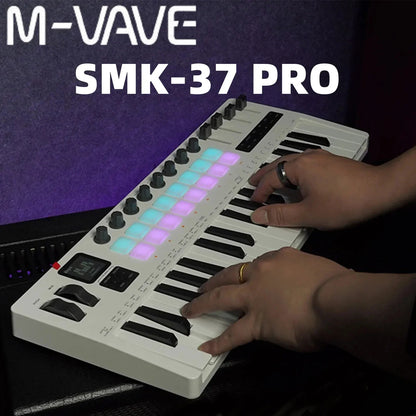 White m-vave smk-37 pro midi controller keyboard with black keys rgb backlit drum pads and sliders for music production