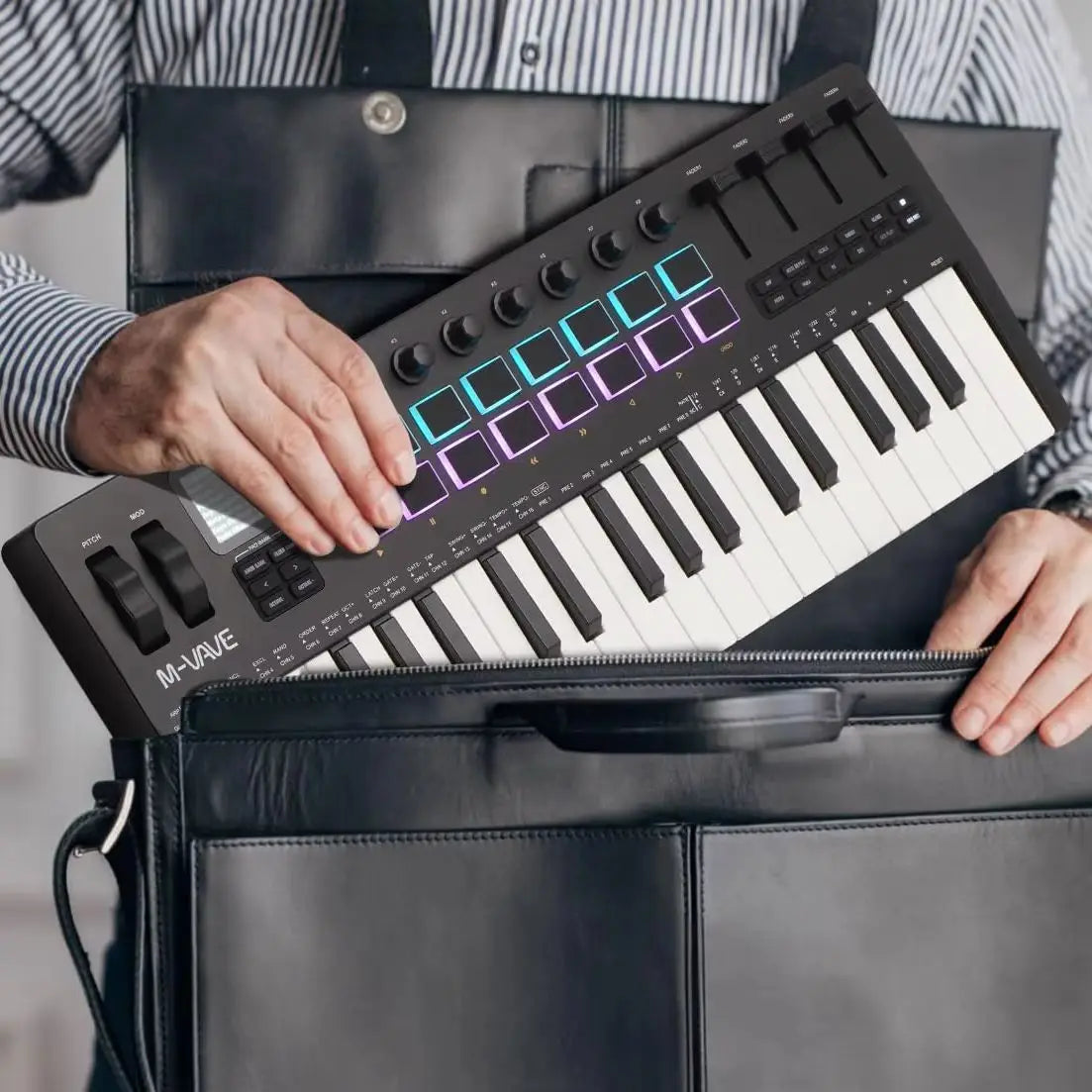 Black m-audio v49 midi keyboard with illuminated blue and purple pads featured in m-vave smk-37 pro wireless bluetooth velocity-sensitive keys synth