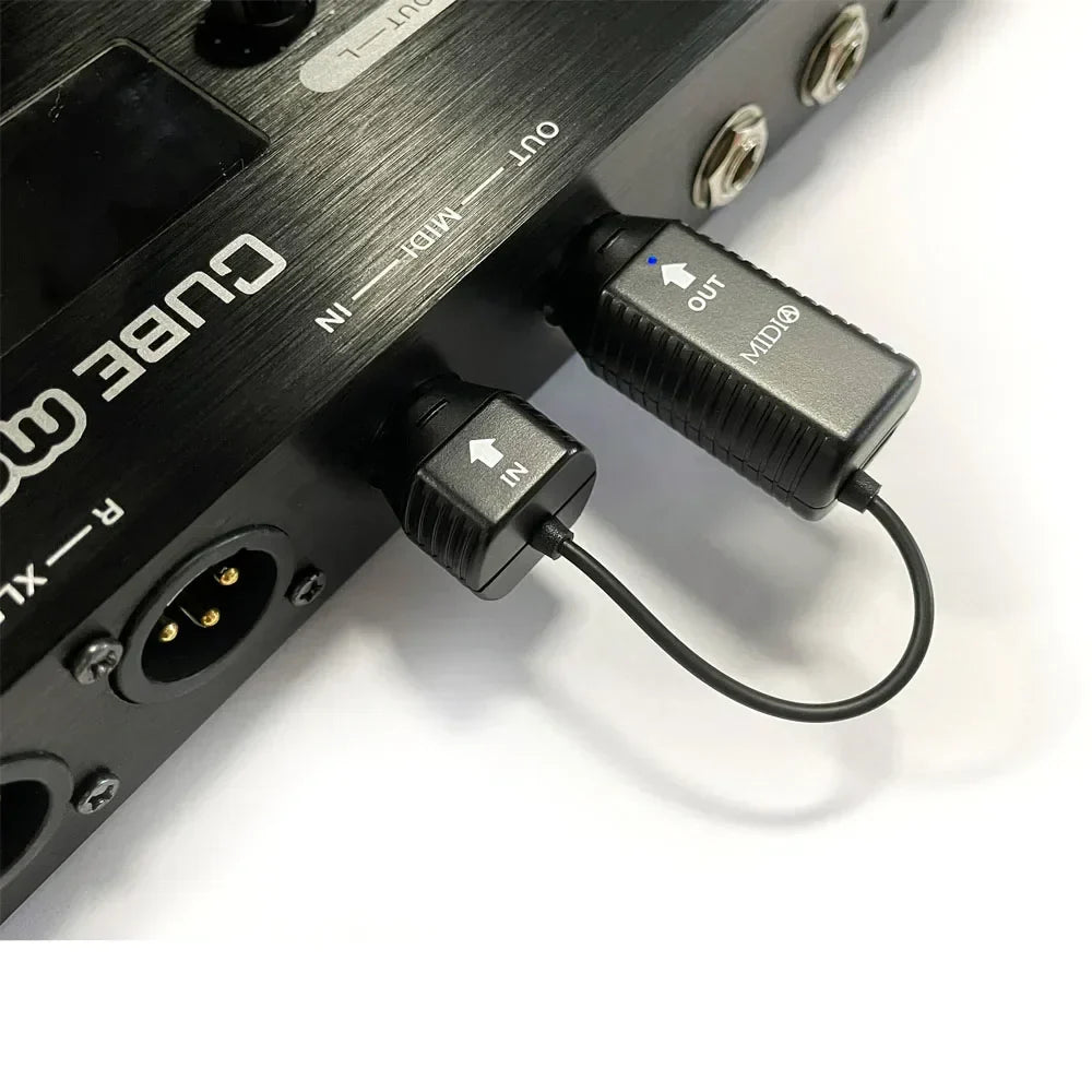 Black midi interface cable with textured grip and labeled in and out ends for m-vave wireless midi bluetooth adapter
