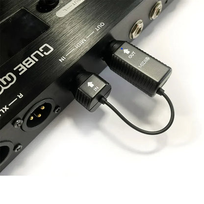 Black midi interface cable with textured grip and labeled in and out ends for m-vave wireless midi bluetooth adapter