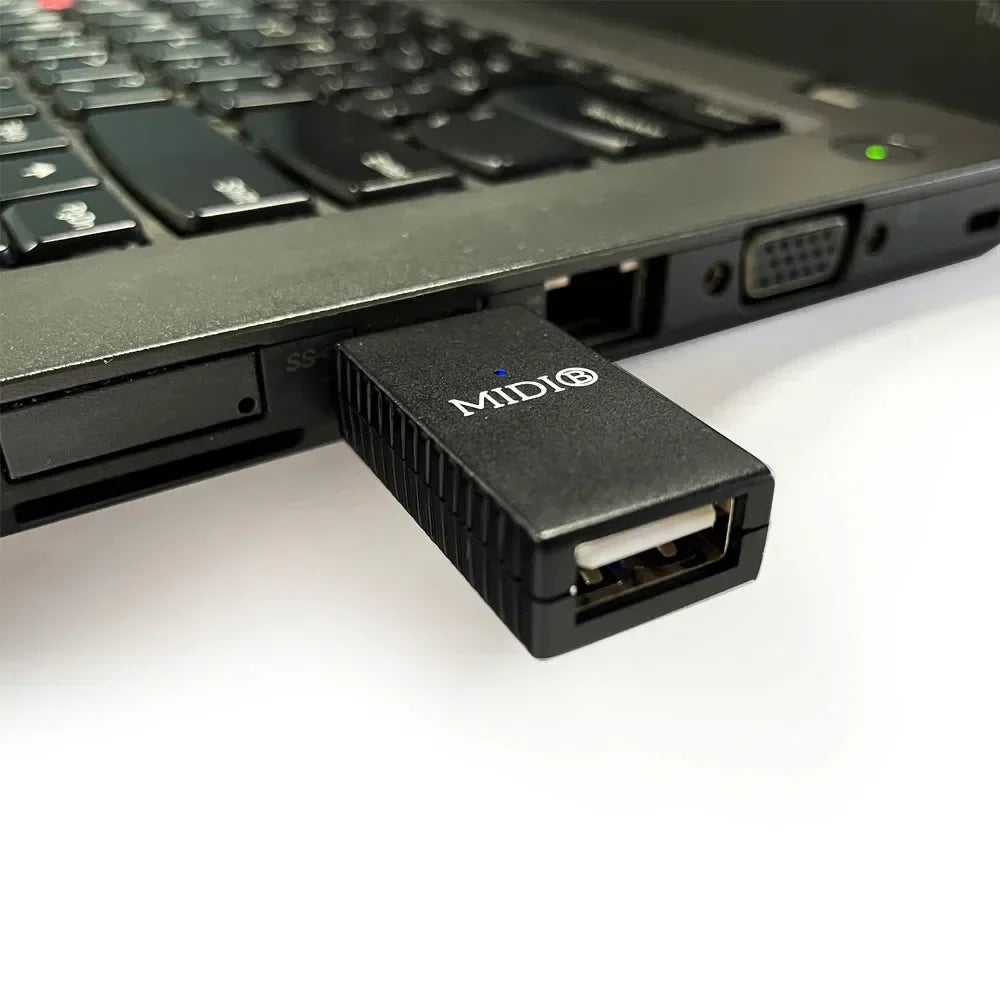 Black midi usb-to-midi adapter with ribbed texture and silver logo for wireless midi piano keyboard android use