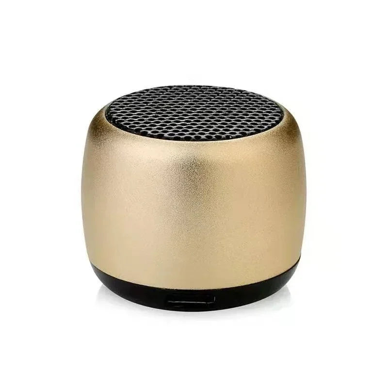 Gold-colored cylindrical portable bluetooth speaker with black mesh top and base for outdoor subwoofer speaker use