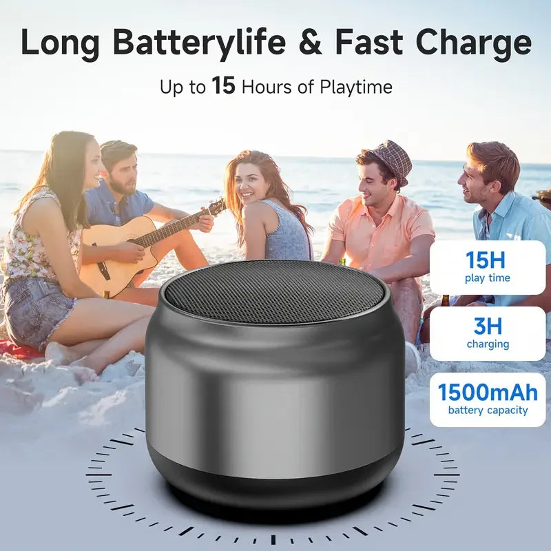 Compact sleek silver portable bluetooth speaker with textured black mesh grille designed as an outdoor subwoofer speaker and audio player