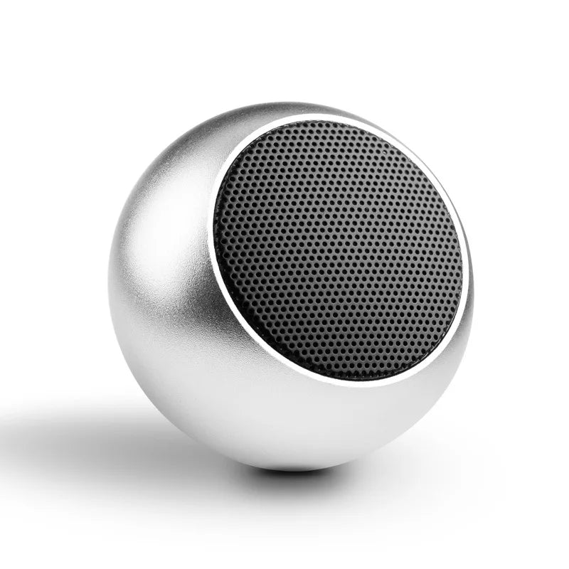 Silver spherical m3 wireless bluetooth speaker with black perforated metal grille for portable stereo surround sound