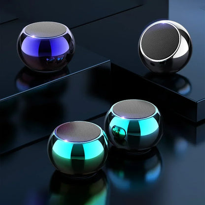 Shiny spherical mini portable m3 wireless bluetooth speakers with iridescent metallic finish and mesh grille
