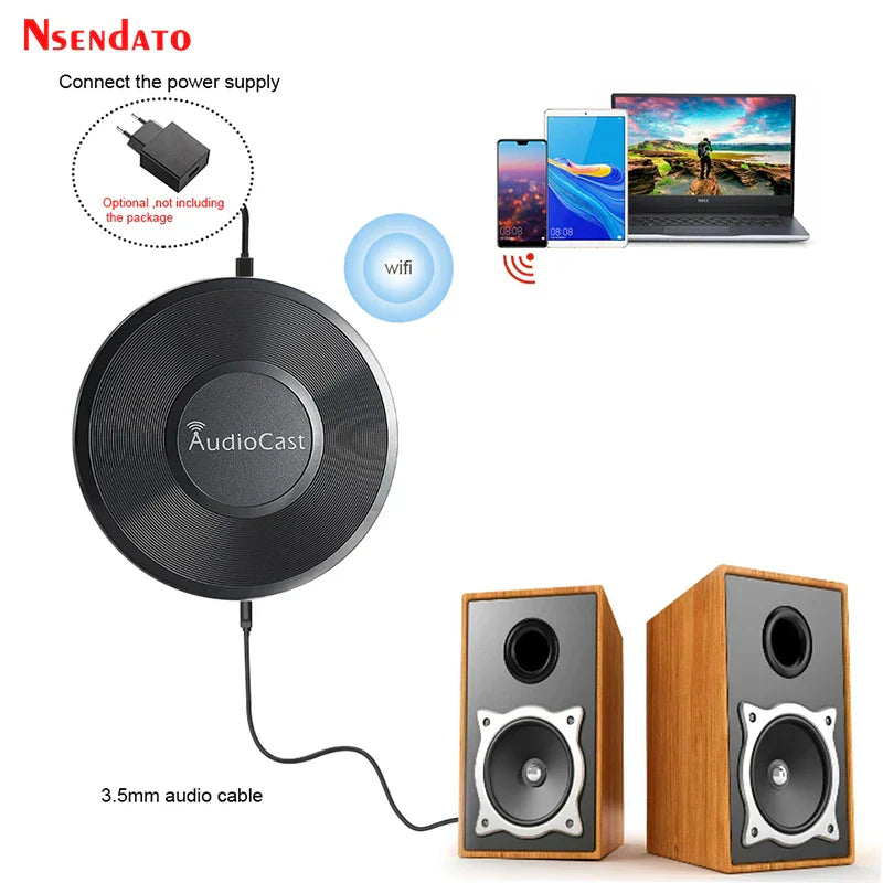 Black circular M5 AudioCast dlna airplay adapter with textured surface connected by 3.5mm cable to wooden music audio speaker