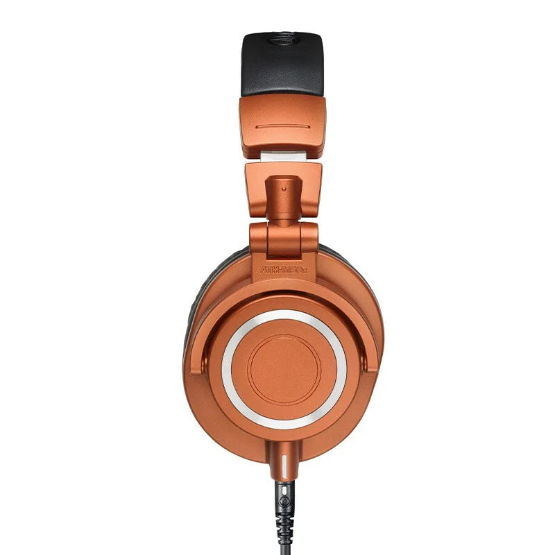 Copper-colored m50x hifi professional fully enclosed over-ear foldable headphones with black padded headband for game music headset