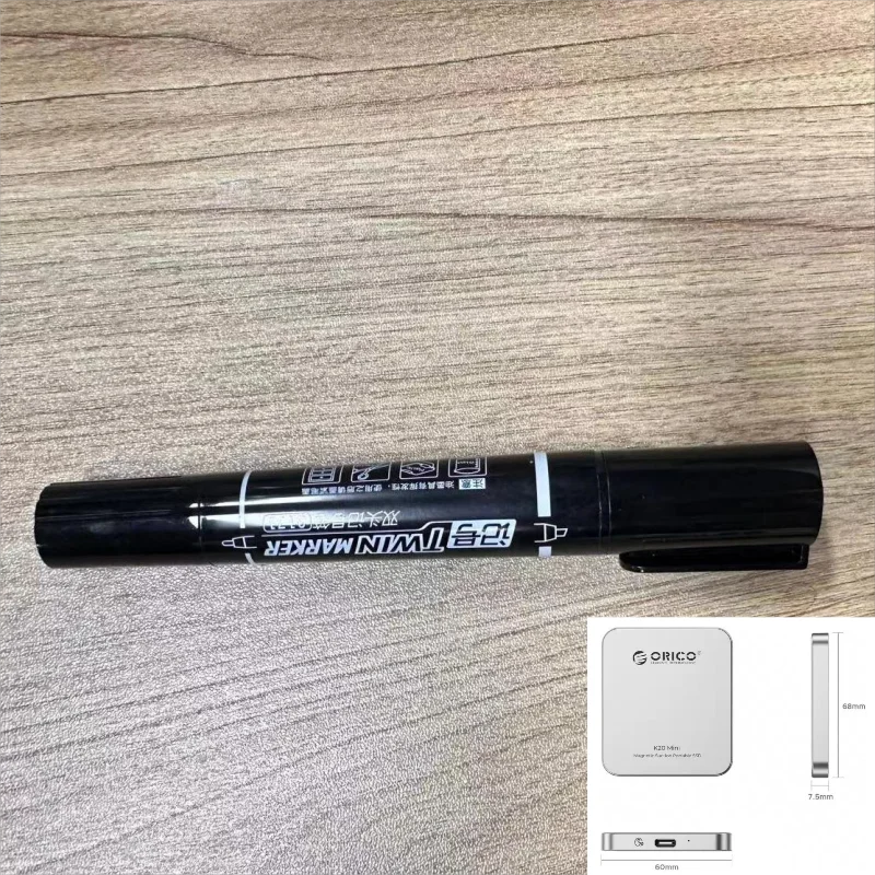 Black dual-tip marker with clip and white Manchez branding for labeling professional computer recording gear