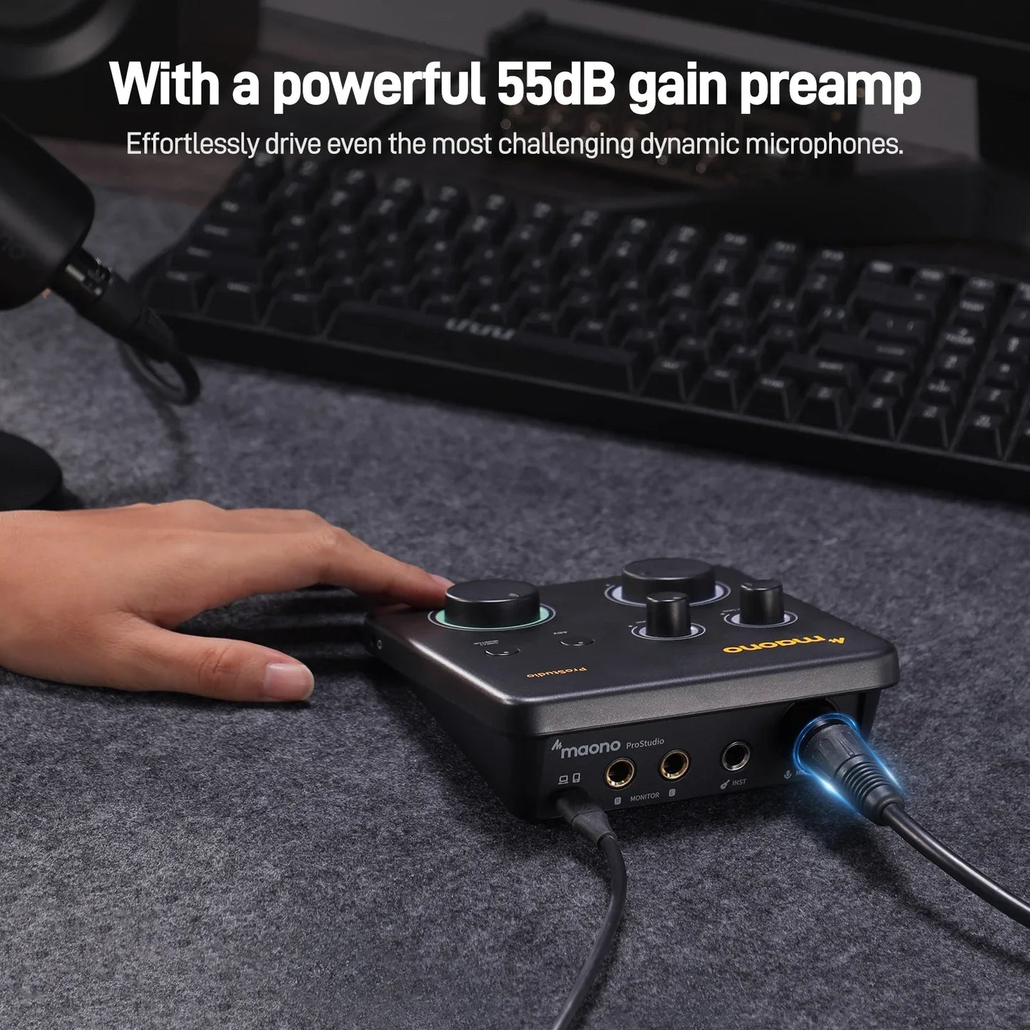 Black maono ps22 lite usb audio interface with three knobs and glowing blue usb cable for recording music guitar with 192khz routing software