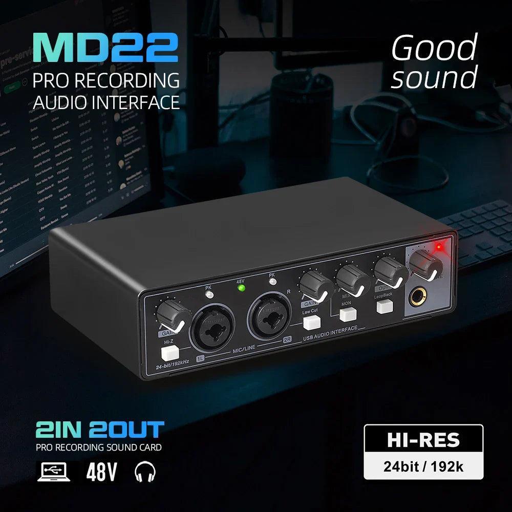 Black md22 professional audio sound card with knobs inputs and glowing red led for electric guitar recording and studio live streaming