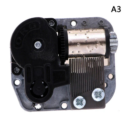 Black and silver mechanical diy windup music box sankyo with metallic cylinder, gears, screws, and key for musical movement