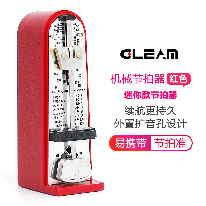 Red clean mechanical metronome with silver metallic pendulum and black base for piano guitar and guzheng rhythm device use