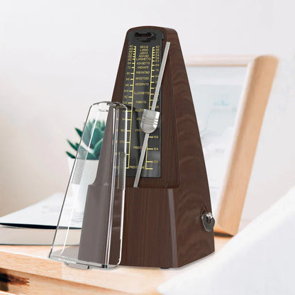 Brown wooden mechanical metronome with clear acrylic stand and silver pendulum for piano guitar violin use