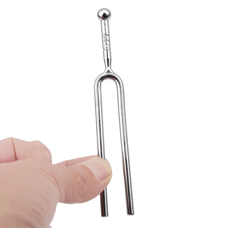 Silver stainless steel tuning fork 440hz with polished surface and engraved markings for hammer healing sound and percussion instrument