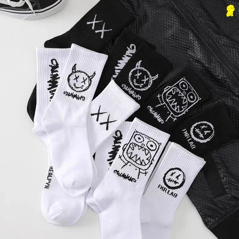 White and black cotton crew socks for men and women featuring devil grimace harajuku graffiti fashion long designs