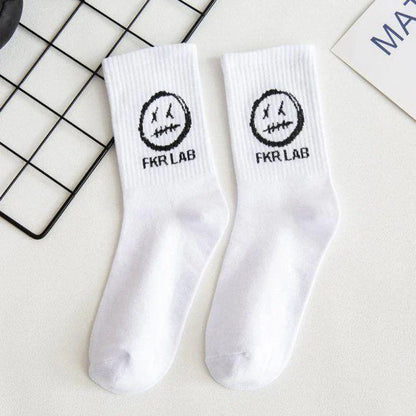 White crew socks cotton with black embroidered smiley face and fkr lab text perfect for graffiti fashion long style