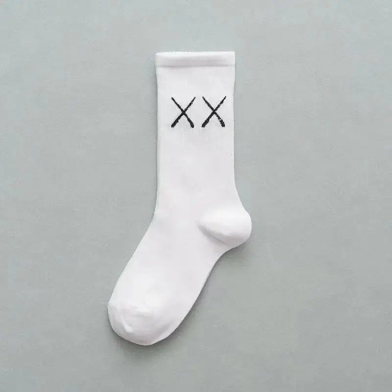 White cotton crew sock for women featuring a minimalist black embroidered xx design in devil grimace harajuku style