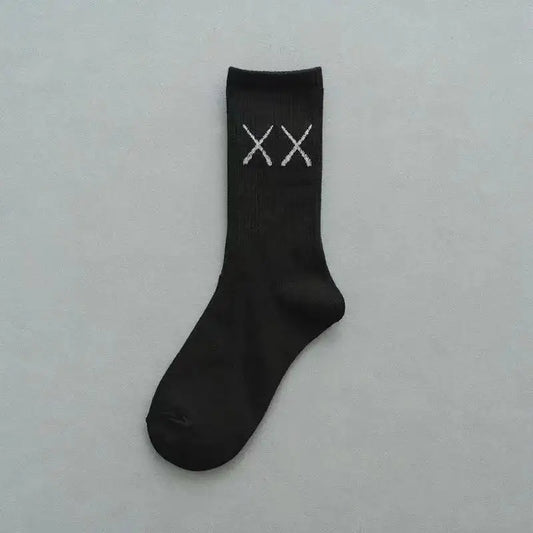 Black crew sock with white embroidered xx logo made of women socks cotton featuring devil grimace harajuku graffiti fashion long design