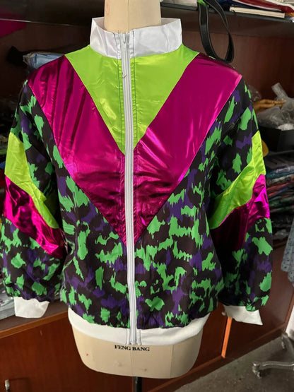 Men’s 80s tracksuit vintage hip hop windbreaker featuring vibrant neon green and magenta geometric shell suit outfits with shiny fabric