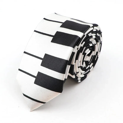 A sleek black and white printed piano polyester classic skinny tie with colorful musical notes neatly rolled for display
