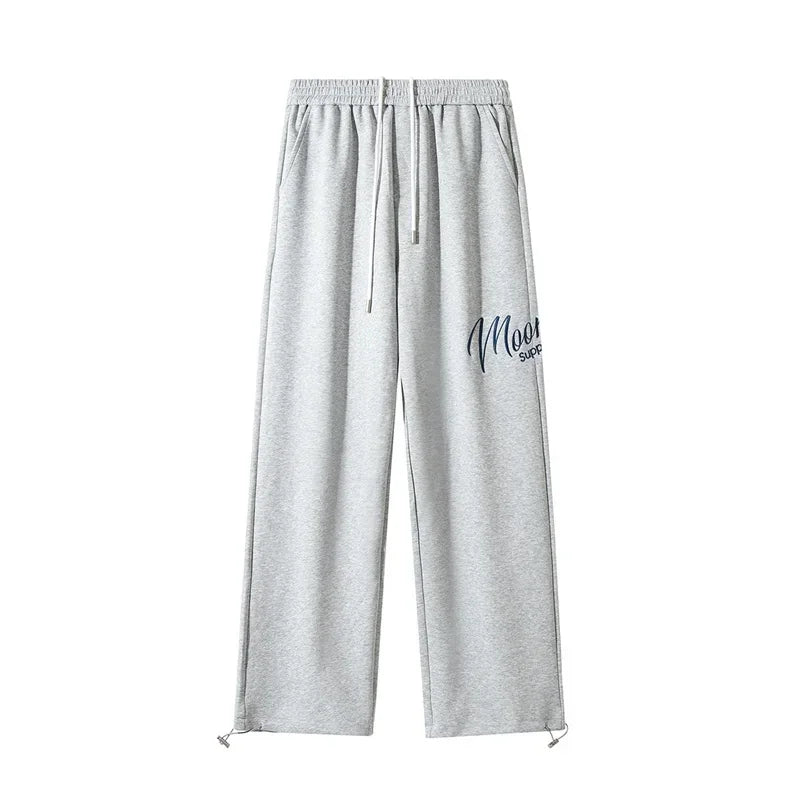 Men’s gray heathered printed wide leg sweatpants with drawstring waist and hip hop fashion y2k streetwear baggy style