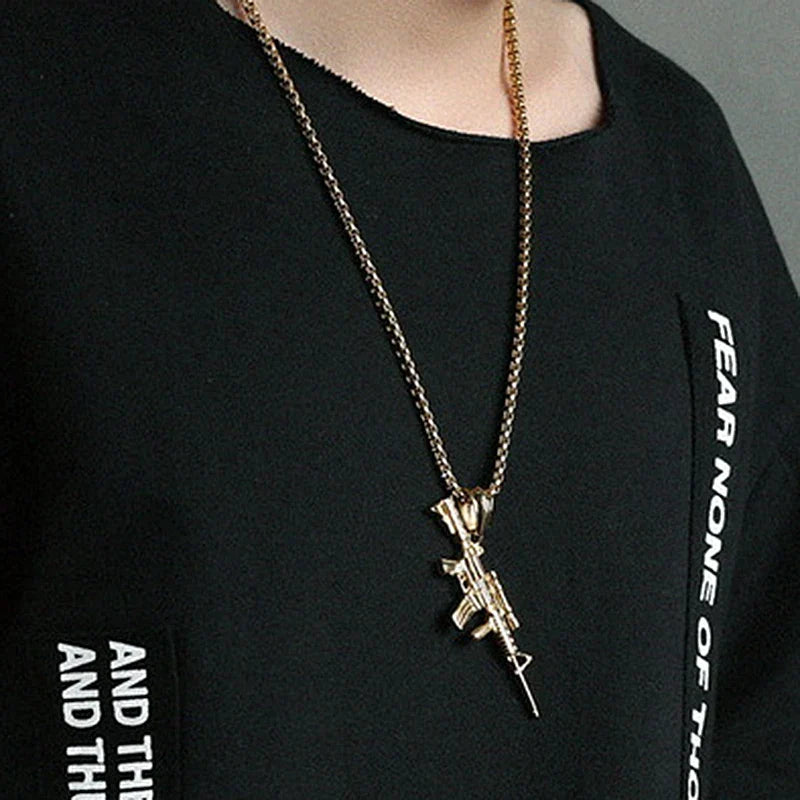 Gold-colored stainless steel machine gun pendant necklace with black gold color hip hop punk design for men