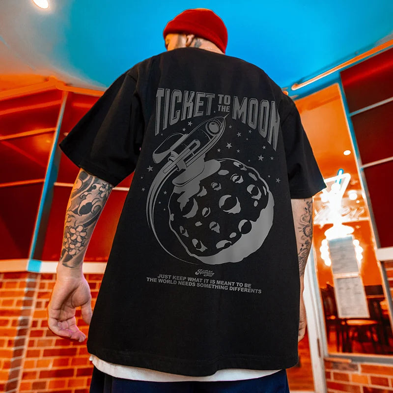 Men’s oversized hip hop t shirt in black with silver rocket printing y2k streetwear and ticket to the moon design