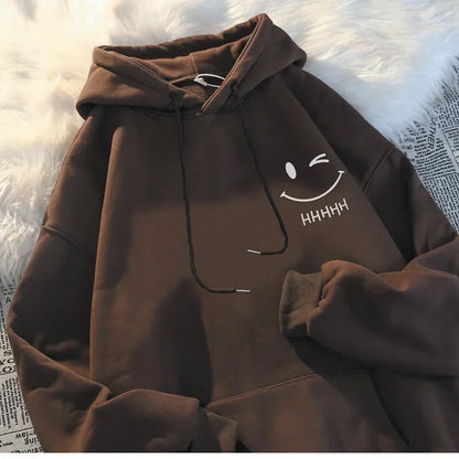 A cozy brown loose thickened cashmere men’s fashion couple hooded sweater with a white smiling face funny embroidery