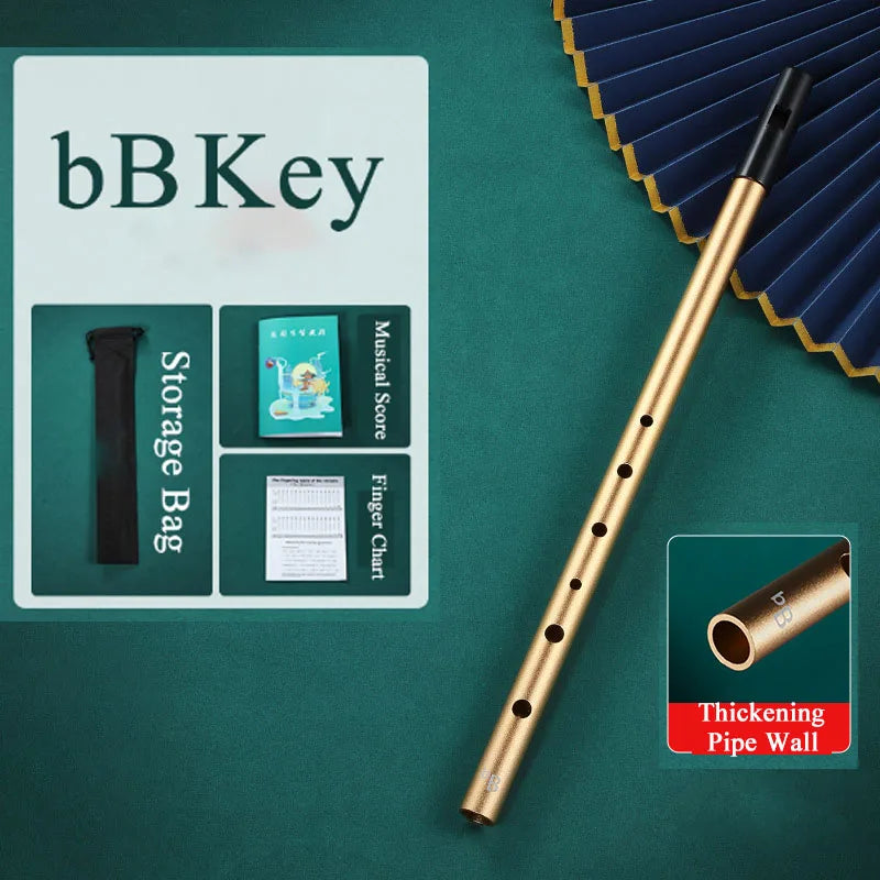 Golden bb metal irish whistle with sleek cylindrical body and black finger holes for student playing recorder use